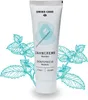 A tube of toothpaste with mint leaves illustration. Produktbild-Vorschau