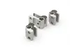 Several metal door hinges are arranged on a white background. Produktbild-Vorschau