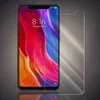 A transparent screen protector is shown placed over a smartphone screen. Produktbild-Vorschau