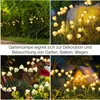 Collage of four images showing mushroom-shaped solar garden lights in various outdoor settings. Produktbild-Vorschau