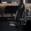 A gaming chair is shown in a modern office or gaming setup. Anteprima dell’immagine prodotto