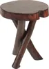 A dark brown, solid wood side table with a natural, irregular top and three crossed legs. Náhled obrázku produktu