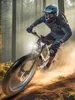 A person riding an electric mountain bike off-road. Produktbild-Vorschau
