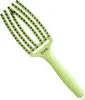 A light green hairbrush with black bristles is shown against a white background. Anteprima dell’immagine prodotto