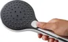 A hand holding a shower head. Produktbild-Vorschau