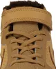 A close-up view of the top of a tan shoe, showing the laces and a velcro strap. Produktbild-Vorschau