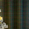 A close-up of a green plaid fabric, likely a curtain or textile. Podgląd zdjęcia produktu