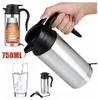 A hand holding a silver electric kettle pouring water into a glass. The image also shows a cutaway view of the kettle and a smaller image of the kettle with its power cord. Náhled obrázku produktu