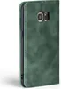 A green flip cover case for a Samsung Galaxy S7 edge phone, shown from the side. Produktbild-Vorschau