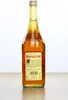 A bottle of Mariacron Weinbrand sits on a wooden surface against a white background. Produktbild-Vorschau