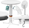 A collage of images showing a white round folding table from different angles, including a close-up of its base and a tag indicating its stability. Anteprima dell’immagine prodotto