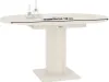 An image of an extendable dining table with a single pedestal base, shown with candles and holders on top. Produktbild-Vorschau