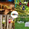Collage of outdoor scenes featuring string lights, a dining area, and a fence with lights. Produktbild-Vorschau