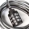 A close-up shot of a water filter attachment for a pressure washer, coiled in its hose. Náhled obrázku produktu