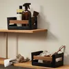 Two storage boxes with cleaning supplies and brushes on wooden shelves. Produktbild-Vorschau