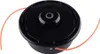 A black trimmer head with orange trimmer line against a white background. Produktbild-Vorschau