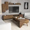 A modern living room with a TV stand, coffee table, and wall shelves. Náhled obrázku produktu
