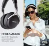 A split image showing a pair of headphones on the left and a woman using headphones and a smartphone on the right. Produktbild-Vorschau