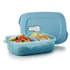 A blue Tupperware lunchbox with food inside, with the lid open. Produktbild-Vorschau