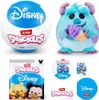 A collage of images showing Disney Snackles toys, packaging, and promotional graphics. Produktbild-Vorschau