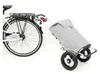 A bicycle with a shopping trolley attached to the rear rack, shown against a white background. Produktbild-Vorschau