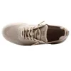A top-down view of a beige women's sneaker. Náhled obrázku produktu