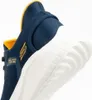 A close-up view of a blue Skechers Slip-Ins shoe, focusing on the side and sole. Voir les images du produit