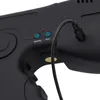 A close-up view of a black electronic device, possibly a listening device, with a cable plugged into it. There are two blue buttons labeled 'RECORD' and 'PLAY', and a red indicator light. Podgląd zdjęcia produktu