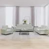 A living room scene with a sofa set and a coffee table. Produktbild-Vorschau