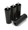 Four black plastic furniture legs with metal threaded bolts are arranged on a white background. Podgląd zdjęcia produktu