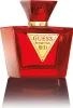 A red Guess Seductive Red Eau de Toilette perfume bottle is shown against a white background. Voir les images du produit