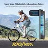 A woman riding an electric bicycle on a road with mountains in the background. Produktbild-Vorschau