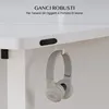 A close-up view of the underside of a white desk with accessories attached. Anteprima dell’immagine prodotto