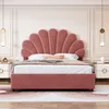 A pink velvet bed with a shell-shaped headboard in a bedroom setting. Náhľad obrázku produktu
