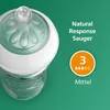 A close-up of a baby bottle nipple and part of the bottle, with marketing text and icons. Podgląd zdjęcia produktu