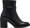 A black leather boot with a block heel and a decorative strap across the ankle. Produktbild-Vorschau