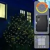 A dark blue house exterior at night with a small tree decorated with warm white LED lights. A product information overlay is on the right side. Produktbild-Vorschau