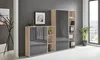 A modern office furniture set with cabinets and shelves, displayed in a room setting with a dark gray wall and a large window. Produktbild-Vorschau