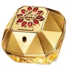 A close-up studio shot of a golden perfume bottle with red gem accents. Voir les images du produit