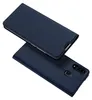 A dark blue flip case for a smartphone is shown against a white background. Produktbild-Vorschau