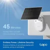 A solar panel and camera are mounted on a white surface against a bright blue sky with sun rays. Podgląd zdjęcia produktu