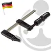 A professional product shot of a clamp on a white and gray background. Produktbild-Vorschau