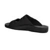 A side view of a black sandal on a white background. Anteprima dell’immagine prodotto