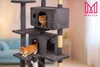 Three cats are playing on a multi-level cat tree indoors. Produktbild-Vorschau