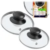 Two glass pot lids with black handles are shown, with an inset image displaying a size chart and product information. Náhľad obrázku produktu