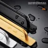 Close-up of three cabinet handles in different colors (black, gold, silver) with water droplets on them, suggesting water resistance. Podgląd zdjęcia produktu