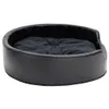 A black dog bed with a dark gray cushion inside, shown from a slightly elevated side angle against a white background. Produktbild-Vorschau
