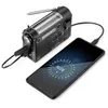 A black emergency radio is shown charging a smartphone. Produktbild-Vorschau