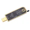 A black electronic circuit board with gold trim and a USB connector, lying on a white background. Náhľad obrázku produktu