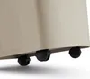 A close-up view of the bottom of a beige storage container, showing three black wheels attached to its base. Produktbild-Vorschau